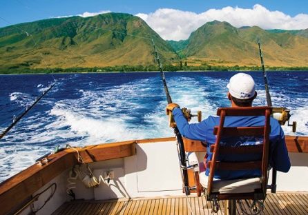 guy sitting with pole